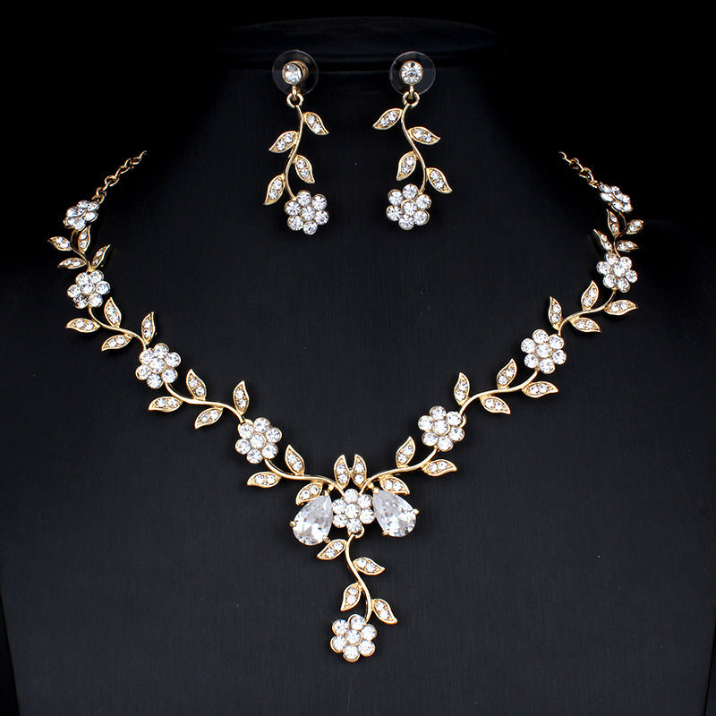 Jewelry set with necklace and earrings on a black background